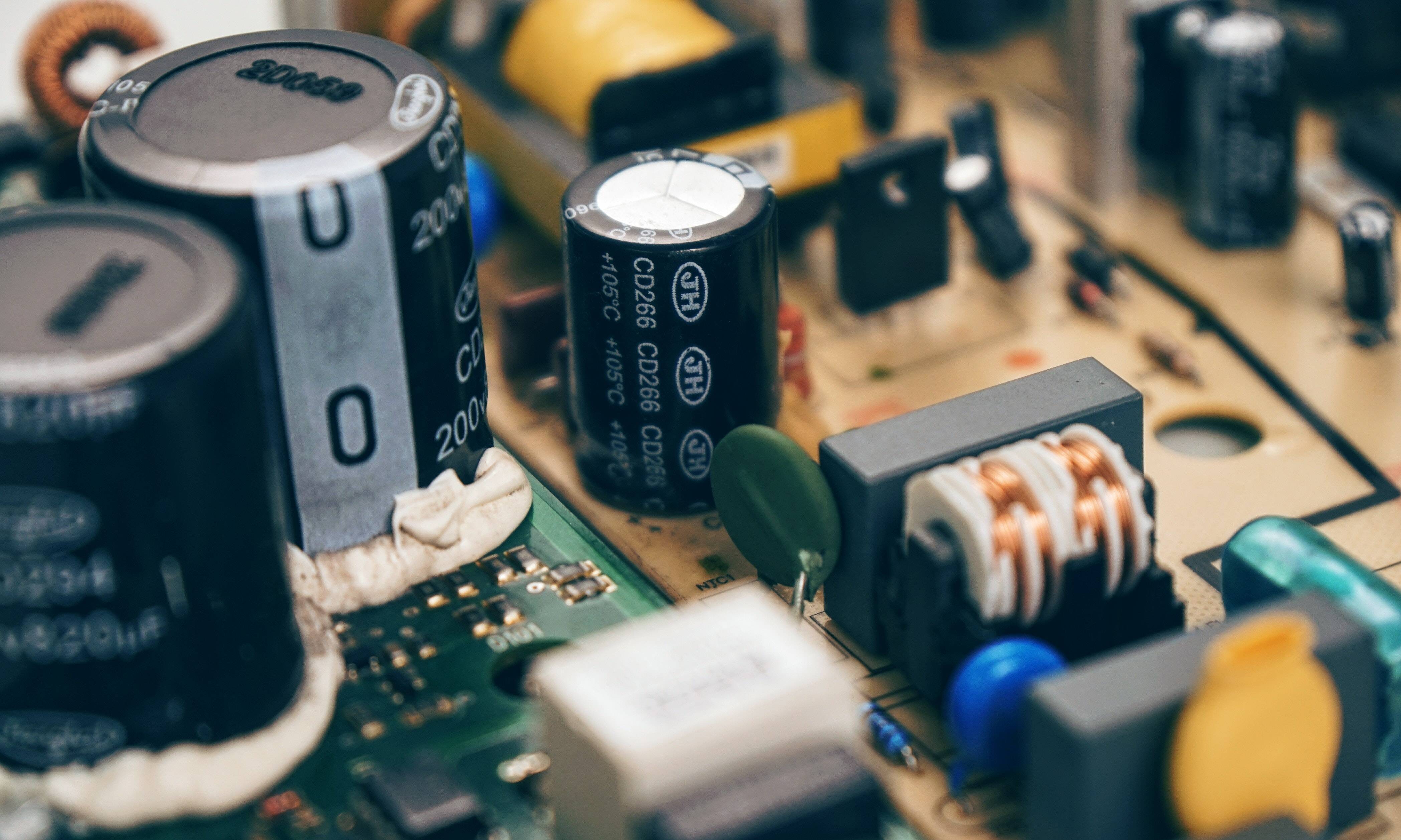 a group of capacitors on a board